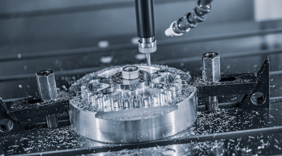 Metalworking CNC lathe milling machine. Cutting metal modern processing technology. Milling is the process of machining using rotary cutters to remove material by advancing a cutter into a workpiece.